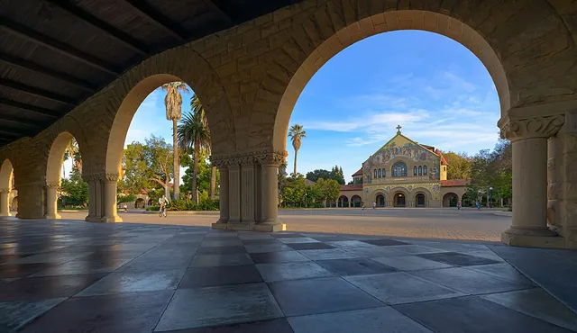 Sandstone arches of Stanford’s Main Quad framing Memorial Church